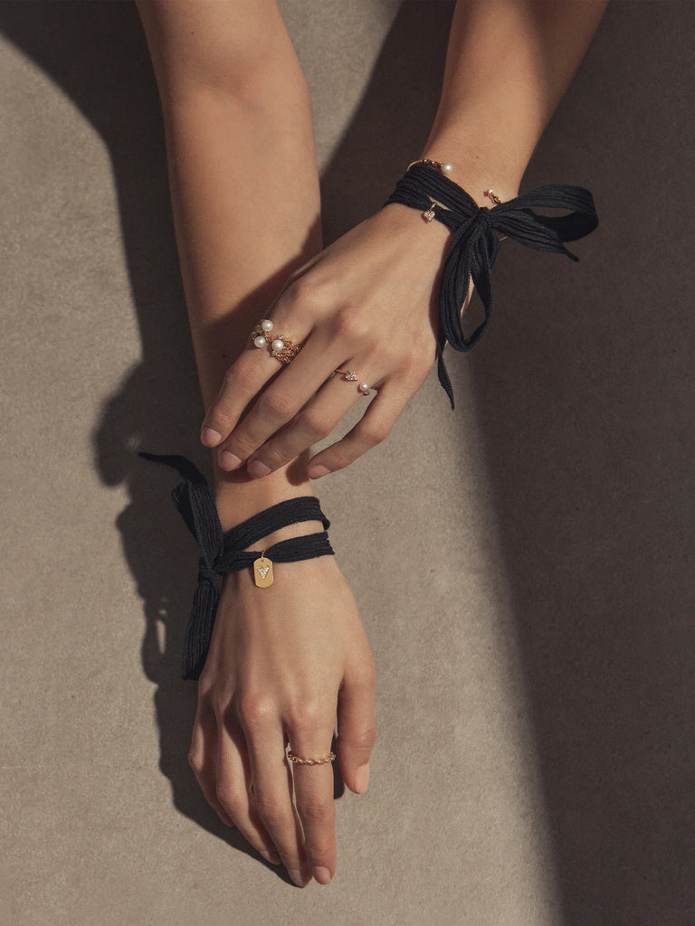 Woman's hands wearing mizuki bracelets